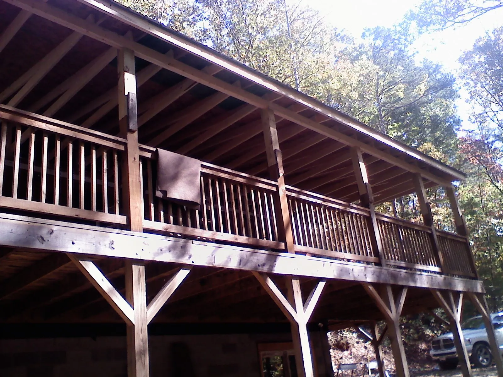 Timber framing under a new elevated porch and deck — Roof Leak Repair in Guilderland Center by Roofing Brothers
